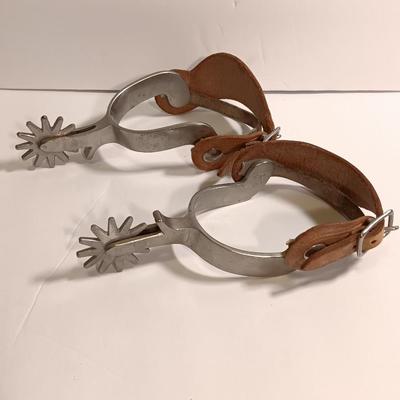 Vintage western Crockett Spurs with leather boot strap engraved with John on the side