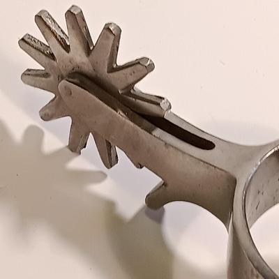 Vintage western Crockett Spurs with leather boot strap engraved with John on the side
