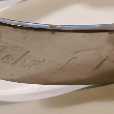 Vintage western Crockett Spurs with leather boot strap engraved with John on the side
