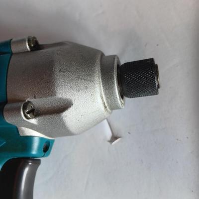 Makita 6932FD 14-volt hammer drill in molded case with accessories