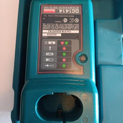 Makita 6932FD 14-volt hammer drill in molded case with accessories