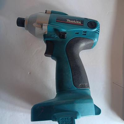 Makita 6932FD 14-volt hammer drill in molded case with accessories