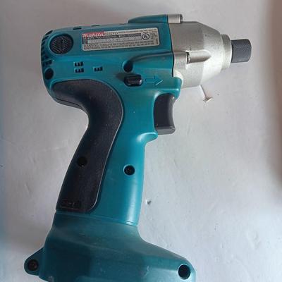 Makita 6932FD 14-volt hammer drill in molded case with accessories