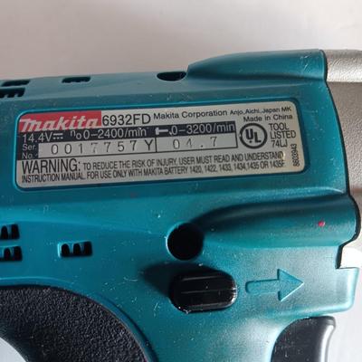 Makita 6932FD 14-volt hammer drill in molded case with accessories