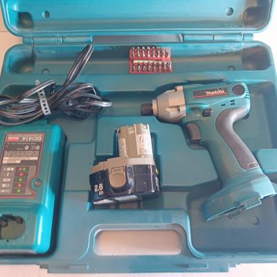 Makita 6932FD 14-volt hammer drill in molded case with accessories