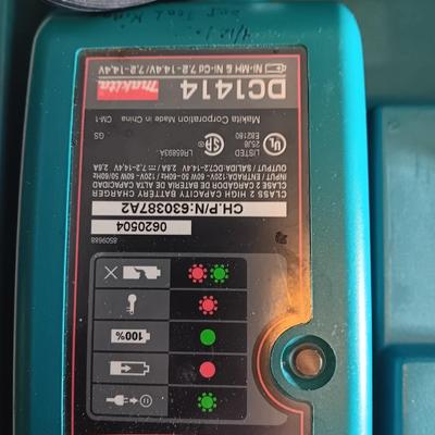 Makita 6932FD 14-volt hammer drill in molded case with accessories