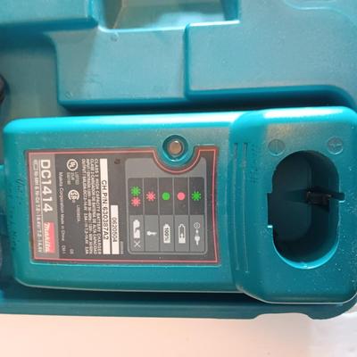 Makita 6932FD 14-volt hammer drill in molded case with accessories