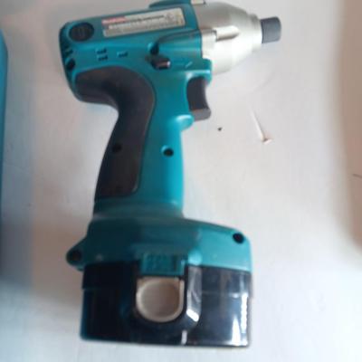 Makita 6932FD 14-volt hammer drill in molded case with accessories