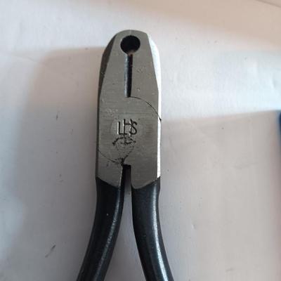 Assortment of hand tools - tape measure - utility knives - level - precision screwdriver set and more