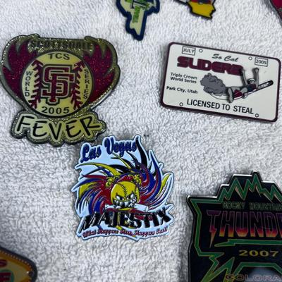 Just a towel of Pins from 2005,2006 and 2007 Women's Fast Pitch Softball. 