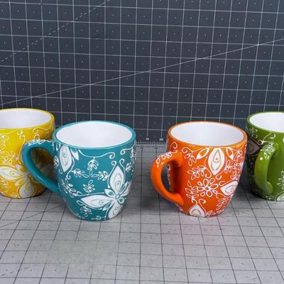 6 MUGS by Laurie Gates Never used. 