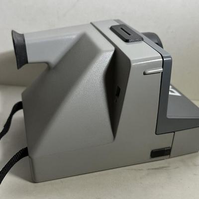 Polaroid SX-70 The Button Instant Film Camera