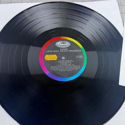 POISON - LOOK WHAT THE CAT DRAGGED IN, With Insert, Near Mint 