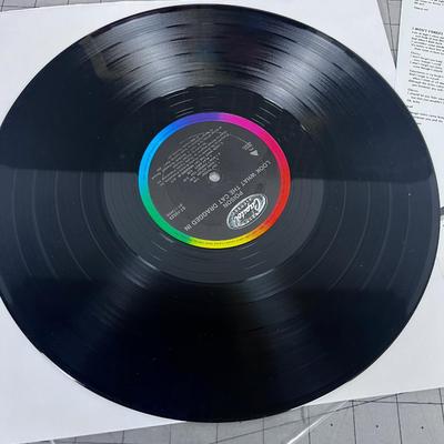 POISON - LOOK WHAT THE CAT DRAGGED IN, With Insert, Near Mint 