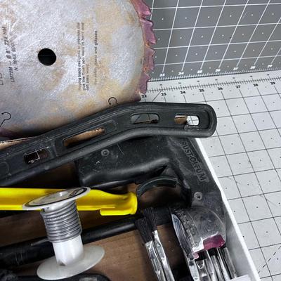 Lot of Work Bench Clean off: Skateboard Trucks, Stapler, Saw Blade
