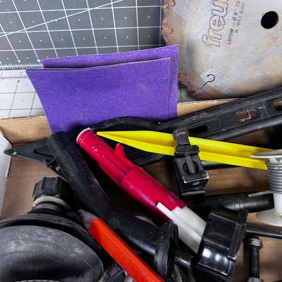 Lot of Work Bench Clean off: Skateboard Trucks, Stapler, Saw Blade