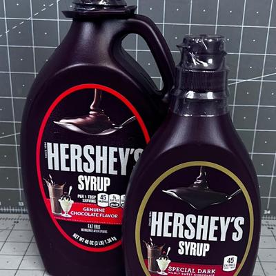 2 Jugs of Hershey Syrup 