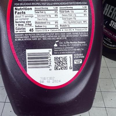 2 Jugs of Hershey Syrup 