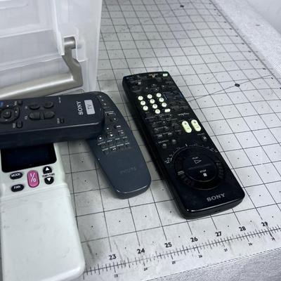Remotes with Plastic Bin