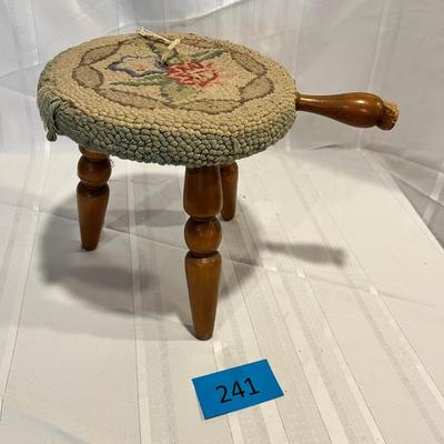 Vintage milking stool with tapestry