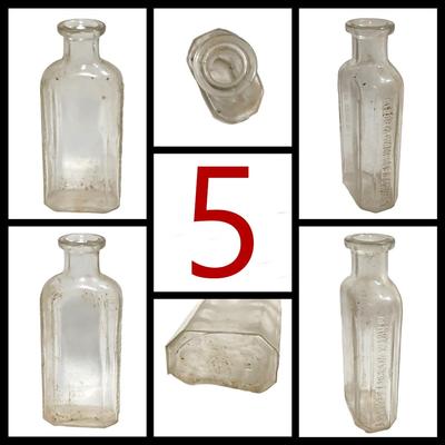 7 Medium Vintage/Antique Glass Bottles
