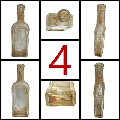 7 Medium Vintage/Antique Glass Bottles
