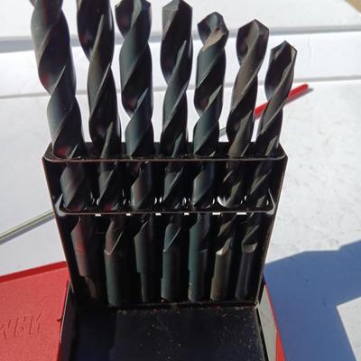 Craftsman drill bit set in metal box with level and magnet.