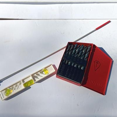Craftsman drill bit set in metal box with level and magnet.