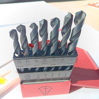 Craftsman drill bit set in metal box with level and magnet.
