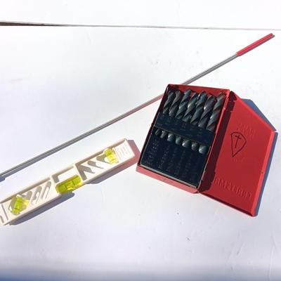 Craftsman drill bit set in metal box with level and magnet.