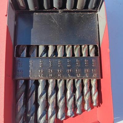 Craftsman drill bit set in metal box with level and magnet.