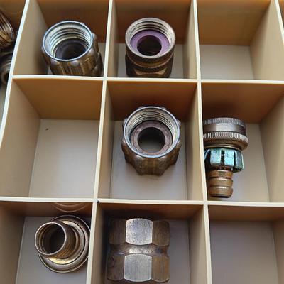 Plano plastic storage cases with an assortment of brass fittings - hose repair and springs
