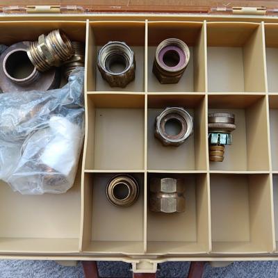 Plano plastic storage cases with an assortment of brass fittings - hose repair and springs