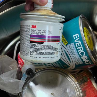 Tub Full of BONDO and Car Patching Products for BONDO