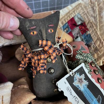 Pin Cushions, Quilted Squares, and Stuffed Animals.