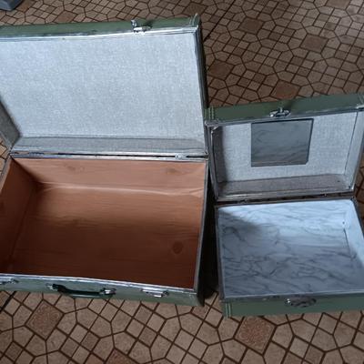 Vintage green suitcase with cosmetic case