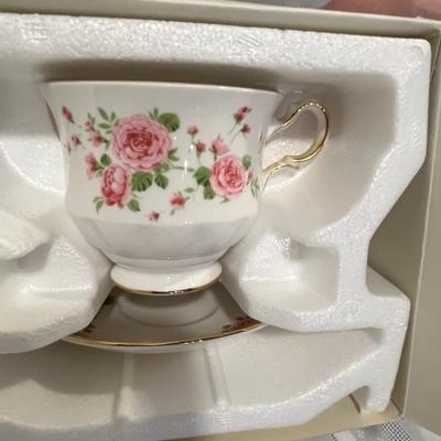 2 Avon Bone China cups & saucers