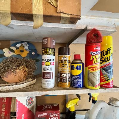 Shelf of decor and other.