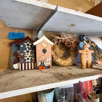 Shelf of decor and other.