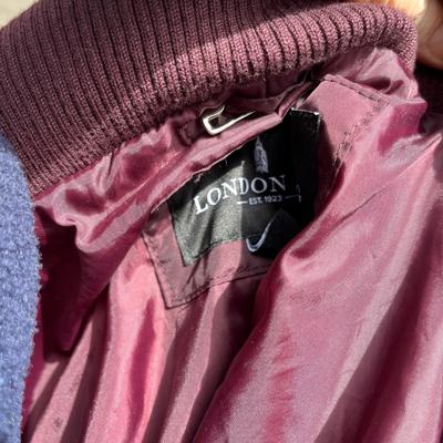 Hall tree full of coats & jackets