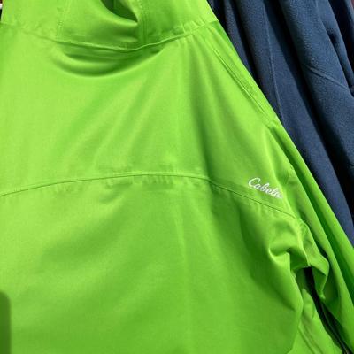 Hall tree full of coats & jackets