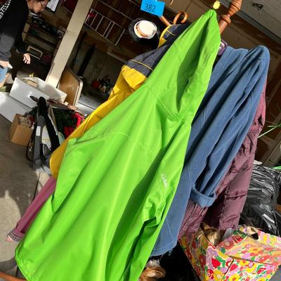 Hall tree full of coats & jackets