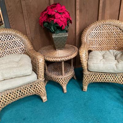 2 wicker chairs and round table