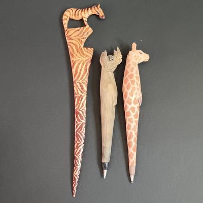 LOT 38: Vintage Decorative Crafts Inc. Metal Elephant Candelabra with Handcarved Wood Pens and More