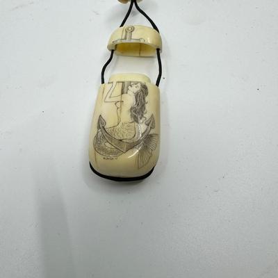 1003 Vintage 60th Anniversary Zippo Scrimshaw Lighter , Necklace , and more