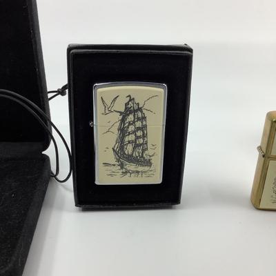 1003 Vintage 60th Anniversary Zippo Scrimshaw Lighter , Necklace , and more