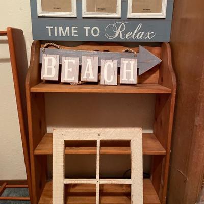 Time to relax , beach sign and white colored wood frame