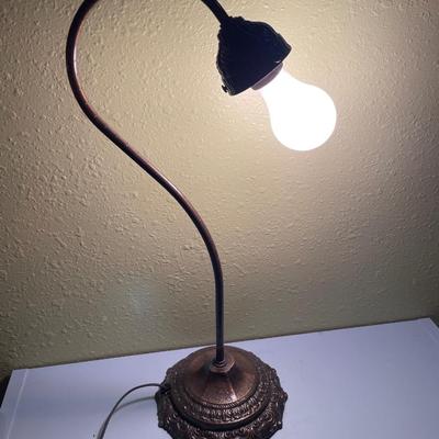 Curved top metal lamp