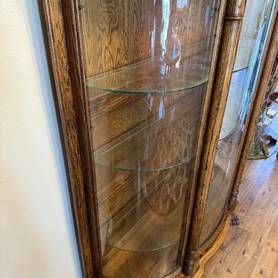 GORGEOUS LIGHTED LION HEAD, CLAW FEET, CURVED GLASS, CURIO DISPLAY CABINET