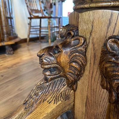 SOLID WOOD TABLE W/PEDESTAL LION HEAD, CLAW FEET AND 6 CHAIRS, 1 LEAF